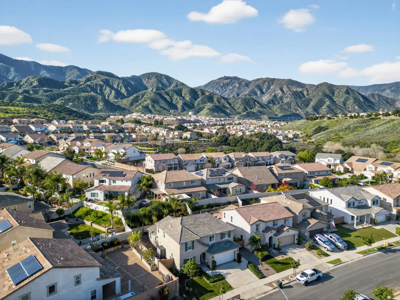 Neighborhood aerial · Inland Empire mountain backdrop
