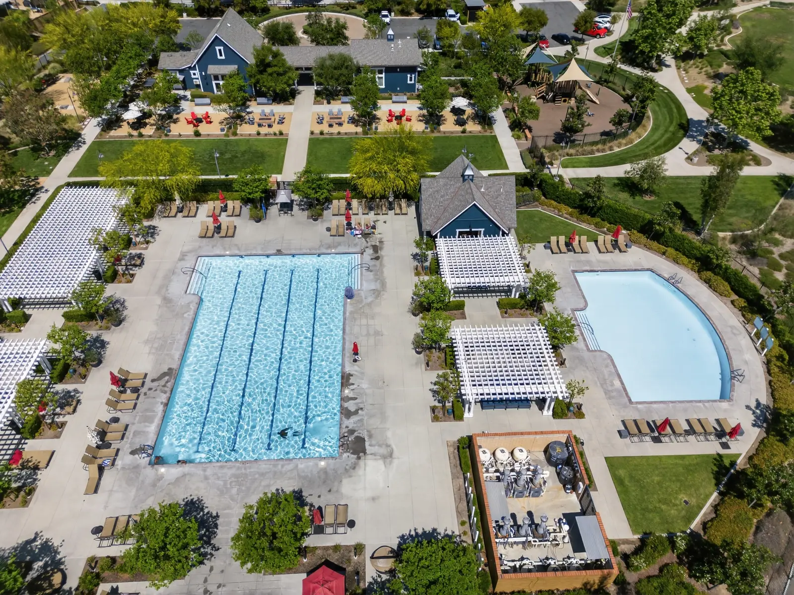 Pool deck, cabanas & clubhouse — community photo by Vista Media Homes