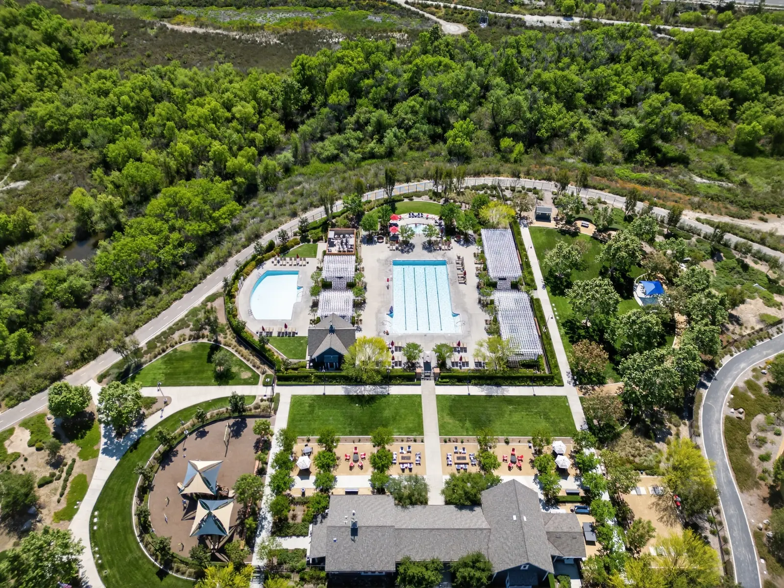 Resort-style pool & cabanas — community photo by Vista Media Homes