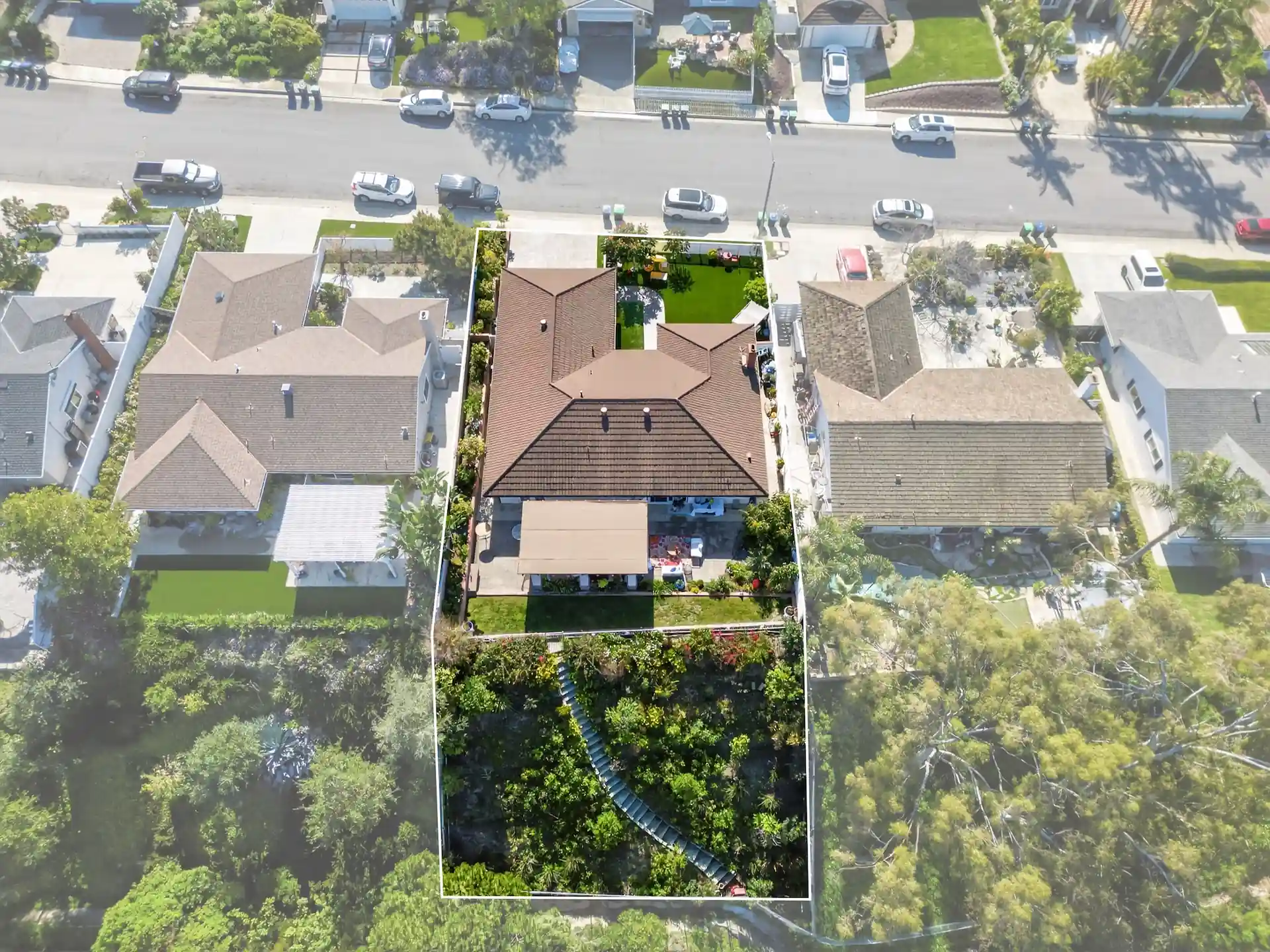 Aerial drone photo of Orange County real estate listing with property boundary