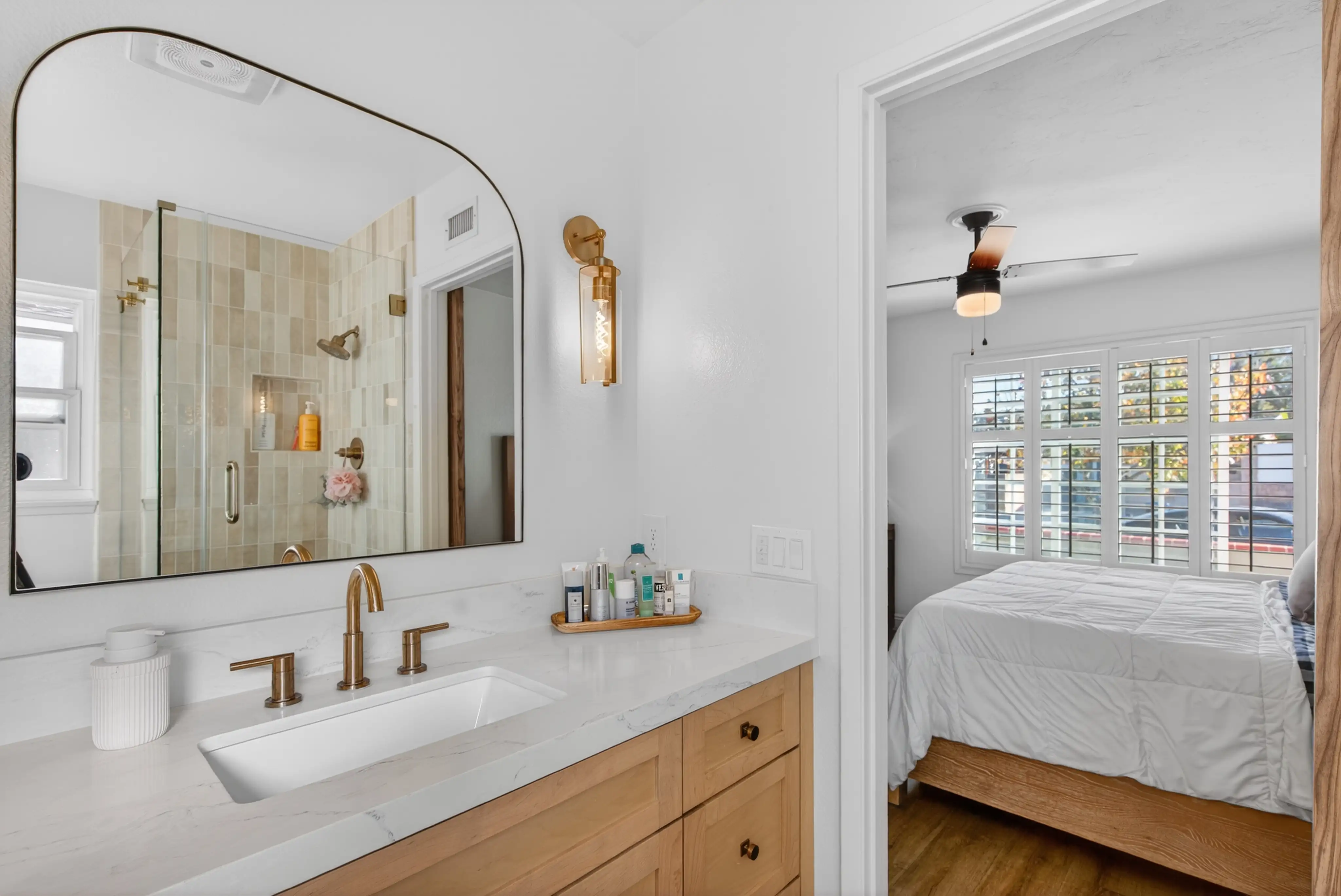 Luxury vacation rental bathroom double vanity arched windows