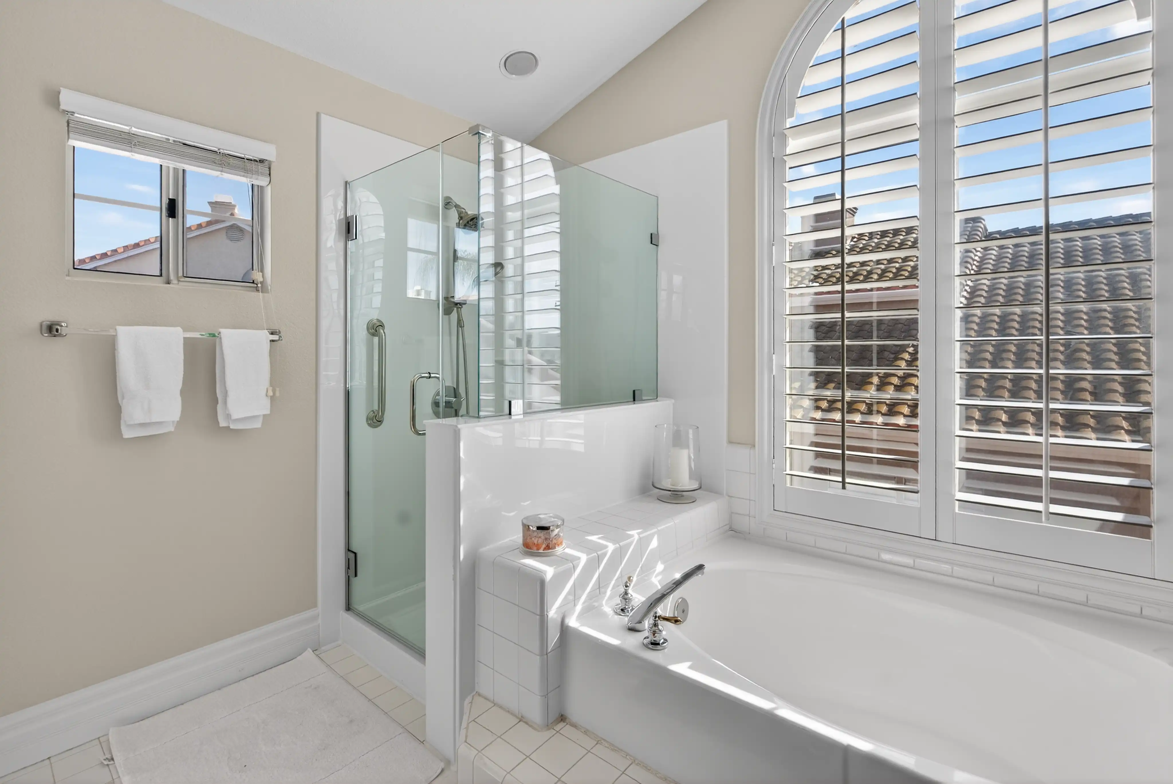 Modern vacation rental bathroom gold fixtures